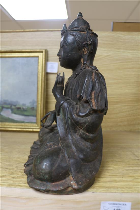 A bronze figure of Guanyin 12in.